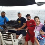 Happy anglers in a offshore fishing daytrip in Cancun