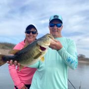 happy angler brags about his big catch of largemouth bass at Picachos lake